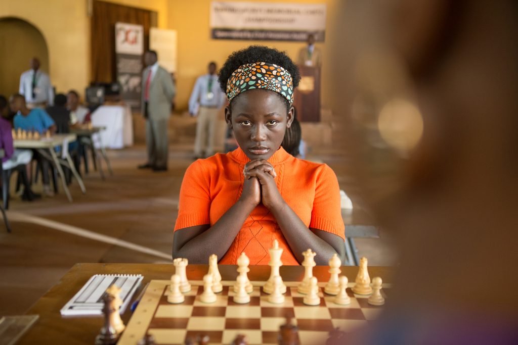 Madina Nalwanga is Phiona Mutesi in Queen of Katwe, the true story of a young girl from the streets of rural Uganda whose world rapidly changes when she is introduced to the game of chess. Photo courtesy: Disney Pictures 
